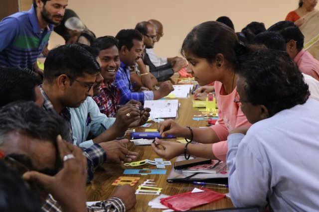 Resource person Manjusha helping the teachers.